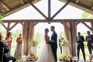 Laura Vandervoort Instagram - The Moment. The Ceremony ✨

Photography: @robertmauriellphotography @johnbregar 
Venue: @langdonhall 
Florals: @beaux.florals 
Event Planner @ashleychanelevents 
Hair: @annastasia_hairandmakeup 
Makeup: @neilsilvermanbeauty 
Dress: @nettabenshabubridal 
Suit: @michelsbespoke 
Dress Alterations: @champagne.and.cupcakes