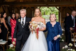 Laura Vandervoort Instagram - The Moment. The Ceremony ✨

Photography: @robertmauriellphotography @johnbregar 
Venue: @langdonhall 
Florals: @beaux.florals 
Event Planner @ashleychanelevents 
Hair: @annastasia_hairandmakeup 
Makeup: @neilsilvermanbeauty 
Dress: @nettabenshabubridal 
Suit: @michelsbespoke 
Dress Alterations: @champagne.and.cupcakes
