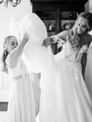 Laura Vandervoort Instagram - ✨ The calm before the forever. Girls getting ready. ✨

Thank you to my Maid Of Honor & Big Sis @vandersgardner for holding everything down and in place for me — especially for holding my hand.

Thank you @oakandluna & @guerlain for my bridesmaids bridal gifts.

Dress: @nettabenshabubridal 

Costume jewelry (something old) from my Dad @ralphvandervoort who bought me jewelry when I was a kid at the Grace Kelly exhibit. I had always been in awe of her. 

Scent was my always go to @lelabofragrances Another 13

Thank you to @champagne.and.cupcakes for altering my dress and making it perfection and for making my gorgeous cathedral length veil! 

📸  Credit needs to be shouted from the rooftops to our amazing photographers @robertmauriellphotography @johnbregar - Thank you for capturing everything perfectly.
 
CREDITS:

HAIR: Thank you to my friend and talented artist @annastasia_hairandmakeup & Thank you @mulberryhairextensions for giving me luscious waves!!

MAKEUP: Thank you @neilsilvermanbeauty - I knew after we did our first press photo shoot together I was using you if I ever got married!!! 

WEDDING PLANNER: Thank you @ashleychanelevents for the magical day and evening and all the emails in between.

VENUE: @langdonhall You were incredibly organized & kind. Staff were extremely helpful! The property is stunning, the food was out of this world and we will forever be in love with your hotel and venue.