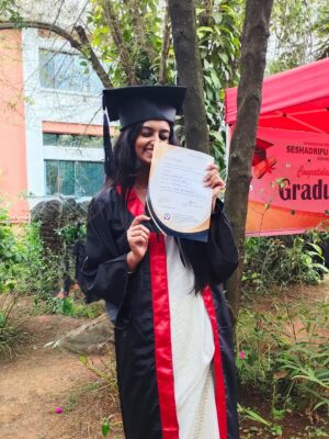 Likitha Murthy Instagram - She rises and she glows✨

Finally wore the graduation gown with a dual degree👩‍🎓……
From not sleeping continuously for 2-3 days while shooting, travelling, and studying between shot gaps, to wearing the graduation gown……. Now, everything counts and matters.

#selfappreciation #post #graduation #day #doublegraduate