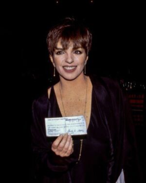 Liza Minnelli Instagram - Hey My Loves, 
Today is World AIDS Day, which arrives with equal measures of heartbreak and hope. Fortunately, medical advances have made normal lives possible for people who have the resources to pay for and access the required medications. Tragically, cuts to the CDC’s Division of HIV Prevention will lead to dramatic rises in infections, deaths, and costs. This doesn’t have to happen.
Here, I am delivering a check to The Foundation for AIDS Research, formerly known as @amfAR, singing a song, and knowing there is still so much more work to be done. We cannot honor World AIDS Day without paying tribute to my dear friend Dame Elizabeth Taylor. Elizabeth was the first globally recognized celebrity HIV/AIDS activist, relentlessly pursuing an AIDS-free world before starting the @ElizabethTaylorAIDSFoundation. I love Elizabeth for a million reasons, and this is surely one of the most special.
In these images, you’ll see Elizabeth and me raising funds for the Elizabeth Taylor AIDS Foundation, and the two of us with Rock Hudson before his diagnosis became public. Dear God, Elizabeth and I loved Rock so much. 
Please consider giving what you can to support of the fight against HIV/AIDS.