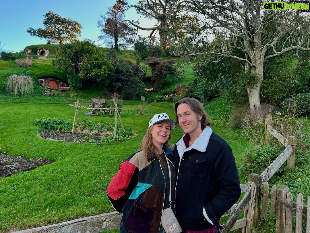 Marisha Ray - 119.9K Likes - There and back again. Our own Hobbit’s Tale. 🌱 

Our entire time at Hobbiton in New Zealand I kept thinking about the quote from Bilbo, “In his heart, I think Frodo is still in love with the Shire. The woods, the fields… the little rivers.” And after seeing it, I mean … who could blame him. Thank you so much to the team at @hobbitontours for an incredible and emotional experience. And, this was such a gift to be able to share it with my mom, as well, who had never taken a trip outside the country before going to Australia and New Zealand with us. 

I think, like Frodo, a part of my heart now belongs in the Shire.