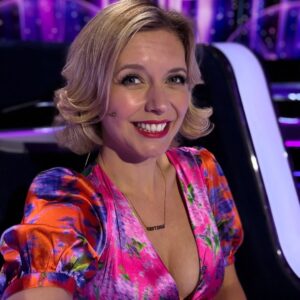 Rachel Riley Instagram - Going for my third spin around The Wheel, tonight Saturday 29th November on BBC One and BBC iPlayer at 8.05PM 🎥 

There’s a different kind of nerves on this sort of quiz show as you’re playing to help other people win themselves some life changing money, not your own winnings for charity. 

Plus, this time both @elliesimmonds and I were on for the treble at the top of the leader board, no pressure then! 🫣🫣🫣

Loads of fun as always, see you there!

@bbciplayer
 #MichaelMcIntyre #TheWheel #iPlayer

Dress @hope_and_ivy 
Custom necklace #gifted @poshtottydesigns @hannah_cooper_