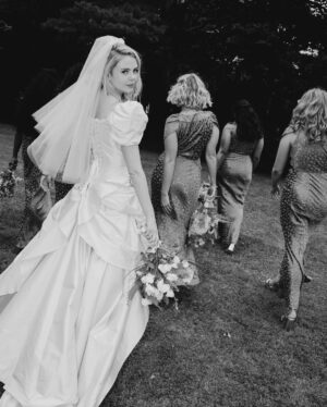 Saoirse-Monica Jackson Instagram - To infinity and beyond 💫💜

Planning: Tara Fay Events @tarafayevents
Photographer: Story of Eve @storyofeve
Video: Muse of Marquise @museofmarquise
Stylist: Katie Bryce @kkittybb
Hair: Timothy David @bytimothydavid
Makeup: Robyn Wheeler @m_robyn_w
Ceremony Music: Biird @biirdofficial & @lisacanny
Pre-dinner Drinks Reception Music: Biird @biirdofficial & @lisacanny
Band: Superfly Covers @superflyeventband
DJ: Steven Simpson @dateline_music
Florist: The Garden @shopthegarden
Venue: Dromaquinna Manor @dromaquinnamanorofficial
Lighting: Gorilla Design @gorilla_design_ltd
Wedding Cake: Broken Spoon Cakes @brokenspooncakes
Favors: Muff Liquor Co @muffliquorco
Groom’s Suit: MacGregor MacDuff @macgregorandmacduff
Drinks Reception Drinks: Guinness @guinness_ireland
Entertainment: Jimi The Kween @jimithekween
Dress: Verons Bridal @veronabridalni
Shoes: Christian Louboutin @christianlouboutin
Bridal Party Pyjamas: Daily Sleeper @daily_sleeper
Bride’s Underwear: Sainted Sisters @saintedsisters
Bridesmaids Dresses: Rat & Boa @ratandboa
Bridesmaids Jewellery: Custom Fada Jewellery @fadajewellery
Bridal Dress & Veil: Custom Annie’s Ibiza @anniesibiza
Bag: Clio Peppiat @cliopeppiatt
Jewellery: Custom Eily O’Connell @eilyoconnelljewellery
Tracksuit & Trainers for Morning: Custom Wee Girl @weegirl_
Afternoon Suit: Sandy Liang @sandyliang
Jewellery: Loveness Lee @lovenesslee
Biird Stylist: Dani Behan @danibehan