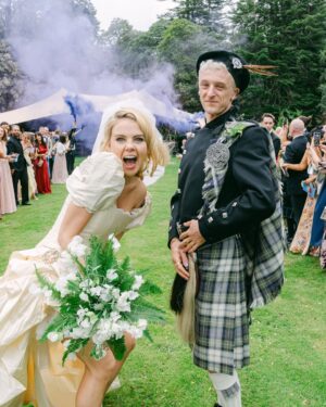 Saoirse-Monica Jackson Instagram - #DerryGirls star #SaoirseMonicaJackson and Scottish DJ #DenisSulta, real name Hector Barbour, are married! The couple said “I do” at Dromquinna Manor in County Kerry, honouring their Celtic roots in front of family and friends, including Jackson’s co-star and bridesmaid #JamieLeeODonnell. The actor called on @AnniesIbiza for her wedding gown, using two points of reference: a Dior design she’d seen on the runway, and an Annie’s Ibiza look worn by #Zendaya. Click the link in bio for an exclusive look inside their weekend-long celebrations. 

Photographed by @StoryOfEve.