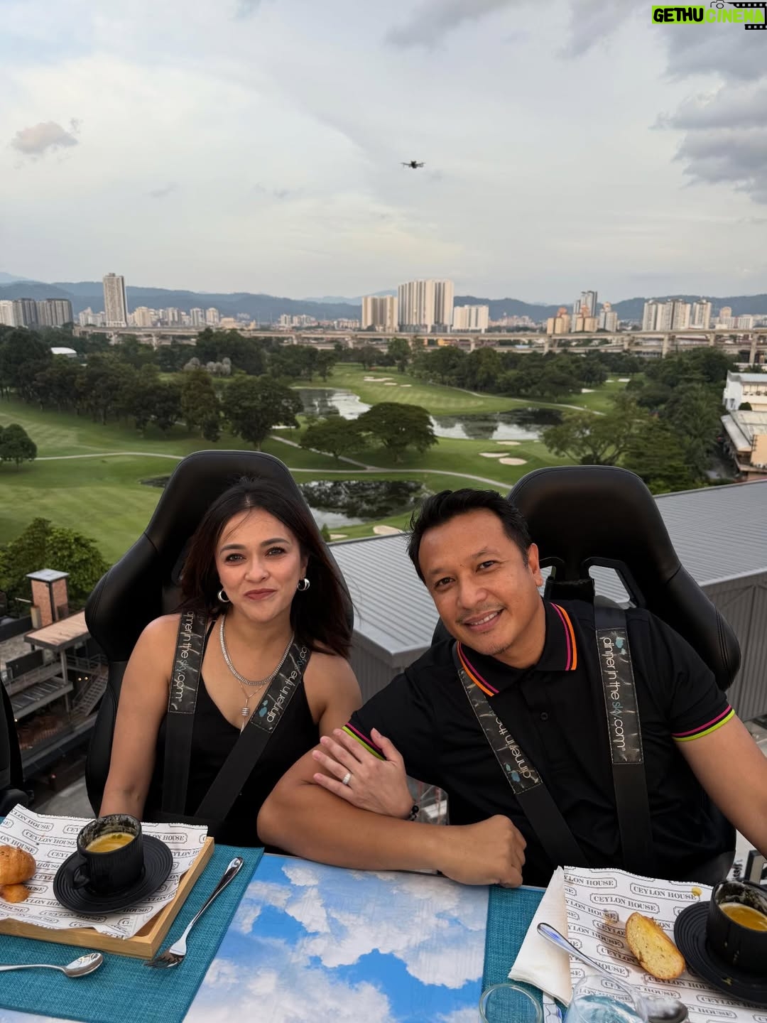 Sazzy Falak - 1.9K Likes - That one time we did “Dining in the Sky” @ditsmalaysia — because why eat on the ground when you can float with the skyline? 😌
I love heights, and being able to watch KL shift from a warm sunset into a sparkling city of lights… 😍 It’s a view I’ll remember for a very long time.

Amazing company, amazing food, and a little adrenaline — the perfect recipe for an unforgettable night.

#ditsmalaysia #nashsazzy