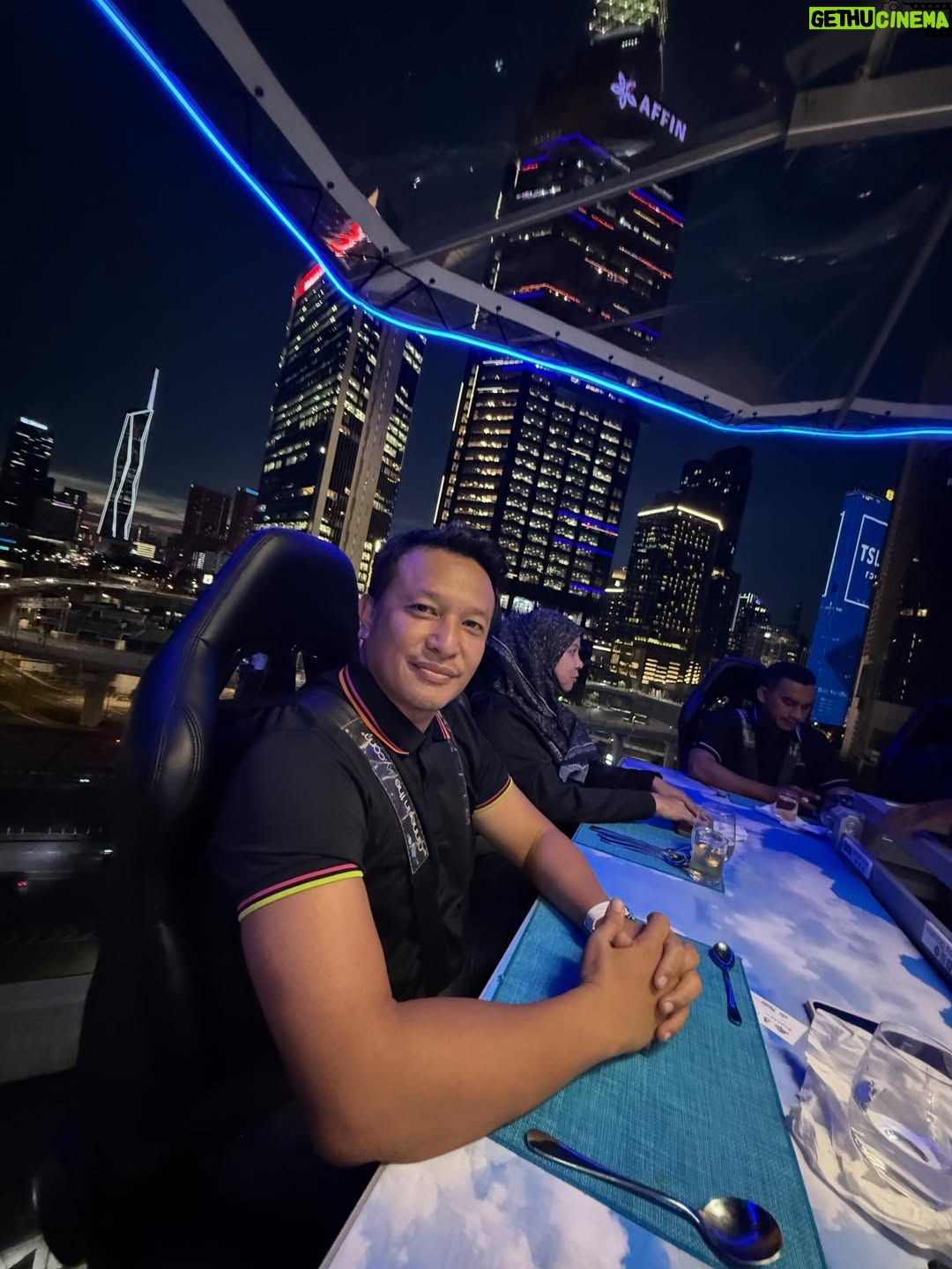 Sazzy Falak - 1.9K Likes - That one time we did “Dining in the Sky” @ditsmalaysia — because why eat on the ground when you can float with the skyline? 😌
I love heights, and being able to watch KL shift from a warm sunset into a sparkling city of lights… 😍 It’s a view I’ll remember for a very long time.

Amazing company, amazing food, and a little adrenaline — the perfect recipe for an unforgettable night.

#ditsmalaysia #nashsazzy