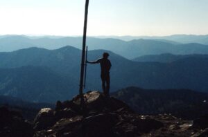 Taylor Rees Instagram - June thru September 1985 right before I was born, Mom (Kelly) spent 4 months of her pregnancy alone in the Pinyon Peak lookout tower in the Salmon-Challis National Forest of Idaho. Just she and unborn me, and Harley the big black dog. Halfway thru the summer my dad and his friends, helitech wildland firefighters that summer, gave her a kitten which she named PK (Pinyon Kitty). They delivered her food by helicopter once every few weeks. Her job was to scan the landscape day and night, especially if she heard thunder, and look for smoke. No wifi, no phones, no television. Just a baby in her belly, wood to chop, and plenty of windy mountain air. I asked her recently if she got lonely, and her response was, sure, but she really enjoyed the long naps. "And did you get scared?" "No, never. Not out there, there were no humans to harm me and the mountains were my friends." 40 years later and the most peaceful feeling for me in the world is this very experience.  Watching the night sky, totally alone, in howling wind, with a big black dog (@baloointhewild). #happymothersday