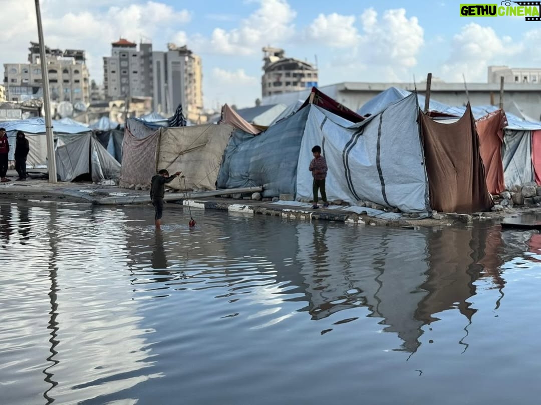 Yasmine Al Massri - 513 Likes - Rain that soaks to the bone, with nowhere to get dry. 

The rain in Gaza is flooding tents, soaking shelters and destroying the only belongings that Palestinian people have. 

It is more than devastating. Palestinians have been surviving through a genocide, through continuous bombardment, homes and community crumbling into rubble, famine and starvation, a complete destruction of health infrastructure. And now, the rain is destroying and dampening any refuge or shelter that existed. 

Our partners are doing everything they can, but in the face of such destruction, it is harder than ever to create conditions that can keep people safe or give them the chance to heal. 

At least 347 people, including 136 children, have been killed in Israeli attacks since the ceasefire was declared, while Israel has continued to block aid and desperately needed medical supplies. 

We call on the international community to act, and to hold Israel’s Government accountable for war crimes. 

Please share. Please donate to support our partners work via the link in our bio. 

End the genocide. 

Images from our partner @aneraorg