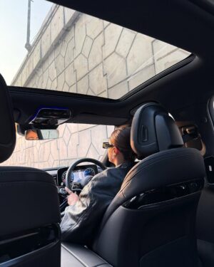 soundarya thakur Instagram - She’s focusing on her 🖤 >>>>

Outfit @zara 
Sliders - @dior 
Glasses - @balenciaga 
Earrings - @chanelofficial 
Bag -  @ysl 
Car - @mercedesbenz E450

#mercedesbenz #mercedes #E450 #luxuryride #ootd #delhiwinters #leatherjacket #urbanfashion #chicvibes  #octoberevenings #citydrive #goldenhour #sunset #soundaryathakur #formocloset