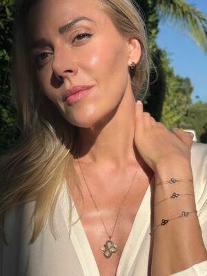 Allison McAtee Instagram - 💎 Like diamonds, we are multifaceted, reflecting different colors from every angle. We are comprised of both light and shadow, ☯️
… dancing in conflicting perfect truths. ♾️
. ✨Expansion requires us to have the courage to reveal and embrace the hidden parts of ourselves. The ones we once tried to outrun. 
Our souls seek for us to lovingly embrace the light and shadow. 🤍
.
If you’re calling in your biggest, boldest WHOLE self, I’m thrilled to share this: 
 ⭐️ Free 8-Day Meditation Challenge⭐️ 
Created by @elodieattiasparis ‘s founder. 
Meant to reconnect you with your intuition. 
.
 Link to meditation in my bio ✨
.
Allow the quiet wisdom into the cracks. Dare to embrace every part of you. ✨🤍♾️🤍✨
.
@elodieattiasparis carries the number 8 as an invocation. A symbol of infinite balance, cyclical becoming, and a reminder that wholeness isn’t light alone but the harmony created when light moves with shadow. ✨♾️✨
Her pieces serve as reminders, to find balance in the stillness. To seek our true self thru the expectation and noise. 
 👉 Follow @elodieattiasparis for more guidance and, intuitive inspiration. And use the code: ALLISON15 thru 2025 to treat yourself (or someone you love.) 🎁
.
#quietluxury #meditationchallenge #inneralchemy