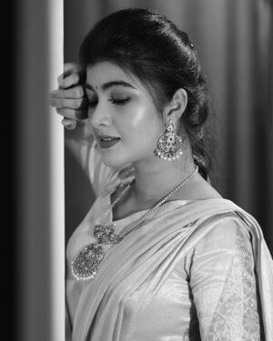 Amrutha Prem Instagram - 🪈🦚

Wearing: @haritva_designer_studio 
Makeup & Hair: @geetha_artistry_ & @sahanadhani__makeover 
Captured by: @pixcelspace