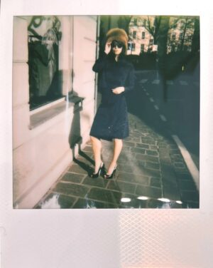 Anjelica Bette Fellini Instagram - Local Italian craftsmanship, done right 

hand sown 1960s Gina Mianchini Moiré silk set paired with a hat from Bolzano’s atelier Biasion

Anjelica for Pezzi di Perla, 📷 by @evavgelder 
special thanks to @staeaeaef