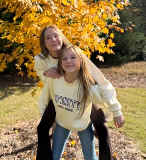 Anniston Price Instagram - It’s sweater weather, and we have the perfect comfy mock neck to keep us warm! This cute Nfinity top gives all the fall vibes and drops November 14th! #sweaterweather #nfinity #twins
