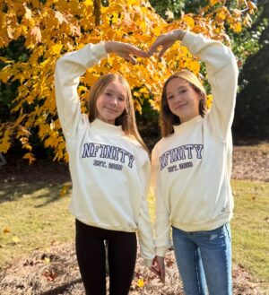 Anniston Price Instagram - It’s sweater weather, and we have the perfect comfy mock neck to keep us warm! This cute Nfinity top gives all the fall vibes and drops November 14th! #sweaterweather #nfinity #twins