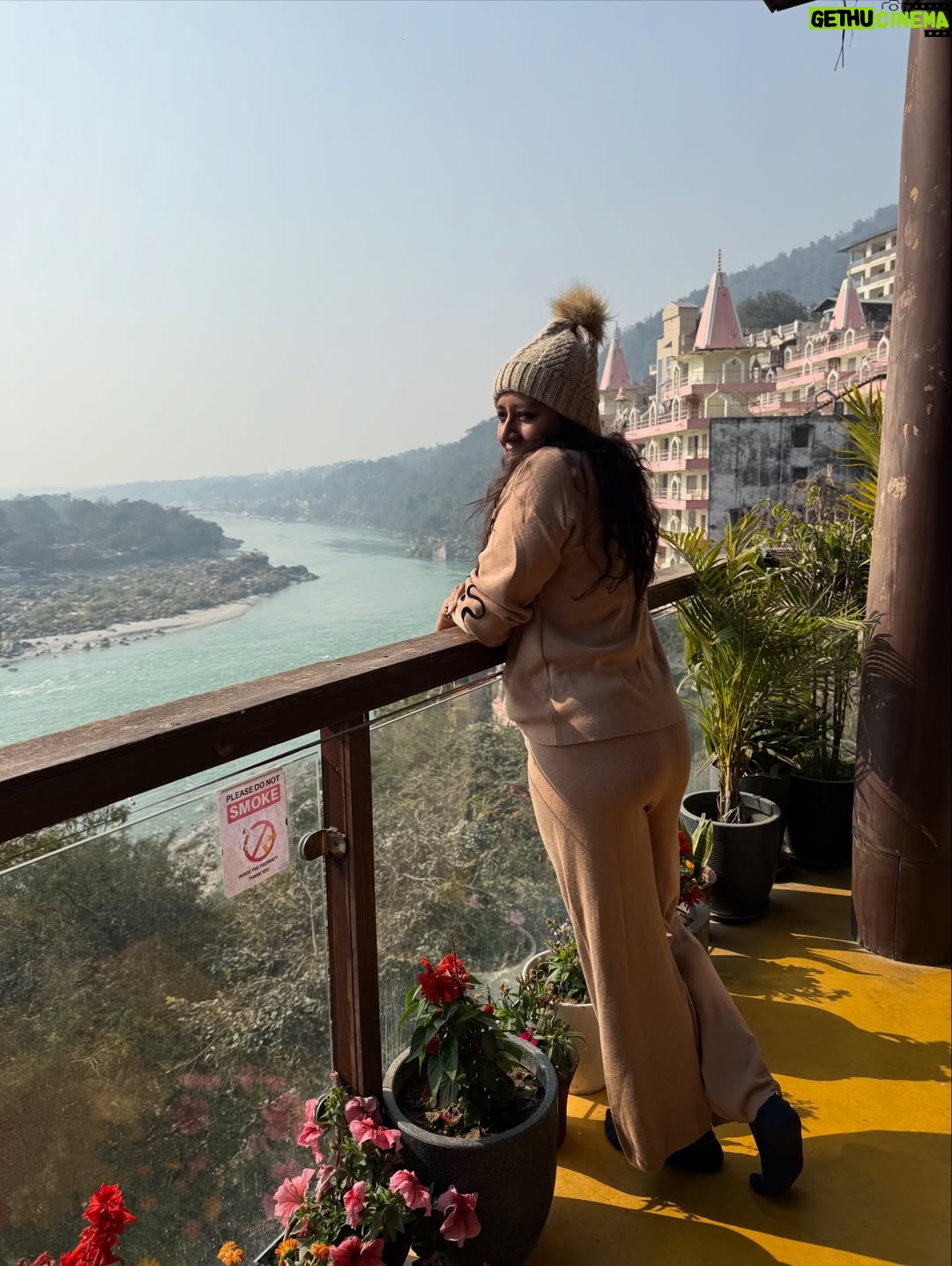 Anumol - 18.4K Likes - A day at Rishikesh 🤍
I didn’t explore much. I came here with no plans just decided to surrender to the place and flow with it. Got to know the city a little, experienced the Ganga, and honestly, that felt enough.
Also, had to mention @bemonkwellness food was amazing, so tasty, and felt like proper healthy food so delicious and looked nice also. So comforting. Loved the ambience, the yoga space, and especially that balcony at the restaurant area🤍 
This day is only about roaming around Lakshman Jula, Ganga Arti and food.. Back home play time with Kanmani, Leela & Yoda. Some places don’t need rushing. They just need feeling 🧿