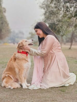 Arooba Batool Instagram - I have a really sad news to share.
There’s a kind of pain that doesn’t scream. It just quietly sits in your chest and makes it hard to breathe.
Today, I’m carrying one of those pains.
My sweet Bella, the soul I once adopted into my arms, has been diagnosed with cancer.
Since the day I got pregnant, she changed. As if she knew. She became my shadow, my silent guard, my constant. She doesn’t leave my side for a second. Follows me from room to room. Watches over me with a love so pure it feels almost unreal. On days I’m tired, she’s there. On nights I’m restless, she’s there. No questions. No conditions. Just love.
It breaks my heart to say this, but my deepest prayer right now is simple:
I pray she lives long enough to meet the baby she has protected so fiercely, without ever being asked to. I pray she gets to see the little life she stood guard over with her whole heart.
I don’t know how much time we have left together. That uncertainty hurts more than words can explain. But I do know this: every single day she has left will be filled with warmth, gentleness, and love beyond measure. She will never know fear. She will never feel alone.
Some souls come into our lives not for a lifetime, but to change us forever.
Bella, you already have. And no matter what comes next, you will always be my brave girl, my protector, my quiet miracle. 🤍