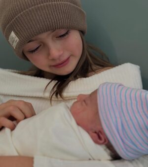 Caroline D'Amore Instagram - When @isabelladamorealt met her baby sister Olive for the first time tears of pure joy rolled down her face. Isabella has dreamt of this moment since she could talk. Begging, writing me letters and praying every night for a baby sibling. Sometimes things don’t happen in the way we imagine but life has a pretty beautiful way of giving you exactly what you need.
