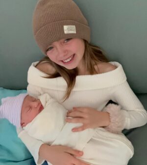 Caroline D'Amore Instagram - When @isabelladamorealt met her baby sister Olive for the first time tears of pure joy rolled down her face. Isabella has dreamt of this moment since she could talk. Begging, writing me letters and praying every night for a baby sibling. Sometimes things don’t happen in the way we imagine but life has a pretty beautiful way of giving you exactly what you need.