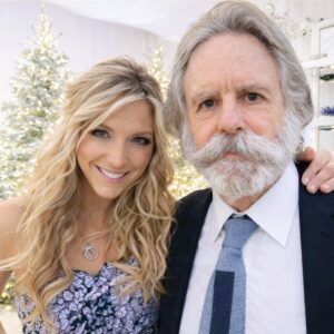 Debbie Matenopoulos Instagram - 💔😔RIP Bob Weir, king of the greatest Jam Band ever. I was SO sad to hear this today. The Grateful Dead was a huge part of my youth. For as much as I loved pop music, I also equally loved the folksy blues and blue grass sound of The Dead. The fun laid back easy vibe really spoke to me (and still does) and the lyrics to the songs are epic! I was first introduced to them as a young kid by my older sister’s boyfriend, who would later become my brother in law. He would always play Dead songs in his car and he had all the cool bootleg cassette tapes from the different shows too. I remember thinking that was SO cool! From then on I was  hooked. I have so many core memories of going to Dead shows in high school and well into my adult life (my last show was 4 years ago) with my best childhood friend Ann.  One time our car got towed at an RFK stadium show but somehow by the grace of God and the kind hearts of some Deadheads we made it back home to Richmond by midnight and even to school the next day! 🤪 About 11 or 12 years ago, I had the pleasure of meeting Bob at a wedding. I was short of breath, my heart was racing and my palms were sweating. This man and his music had been the backdrop for so much of my youth. Despite my nerves, I had to speak to him. So, I walked up to him while he was holding court with a group of some of his musician friends, I shook his hand and said, “Hi I’m Debbie and I am a huge fan.” He said you’re way too young to be a fan of the Dead. I told him how I first heard his music when I was about 10 years old and how his music always put a smile on my face. He couldn’t have been kinder. He invited me to chat with him and his friends for a few minutes. Then before I turned to go back to my table I told him he was the coolest, thanked him for making my childhood dreams come true and told him he was still as handsome as ever. As I walked away, I heard him chuckle and say to his buddies, “I still got it fellas.” It made me laugh out loud. That will forever be one of my favorite experiences in life and I am forever “grateful.” He will always be a musical genius and the coolest rock star ever! May you continue to make beautiful music in heaven Bob🕊️🌹