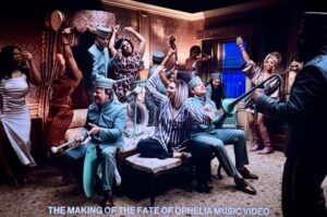 Eliotte Woodford Instagram - Making #TheFateofOphelia MV was not only a nostalgic family reunion but also an exciting celebration of the masterful musical future @taylorswift was creating in real time right before our eyes. 🤩
My heart was overflowing with JOY just getting to be back with my friends that are family and on top of that, we got to put on the COOLEST SKIT EVER! 😂 🎭🎬
My musical theater loving soul couldn’t handle the scale and beauty of each set, wig, costume, and choreography. I was overcome with emotion and gratitude more than once during this shoot. The large scale MGM movie musicals and dream ballets I had always dreamt of being a part of were happening and I now got to be included. 🥹😭🥹
Bravo to the incredible crew that made this happen and to @nopenother and @amandabalen for ALWAYS creating and leading with such grace and genius. 👏🏾👏🏾👏🏾
I just can’t believe I get to be a part of the magical worlds @taylorswift consistently creates. Thank you for including me, and all of us, on this ride, T!
Also- I can’t believe we were in MOVIE THEATERS AGAIN! 🤯
I will always be proud to live #TheLifeofaShowgirl
😘❤️🔥💃🏽