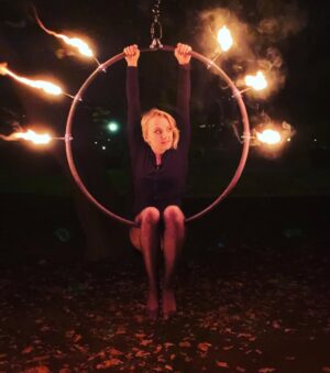Evanna Lynch Instagram - It turns out my aerial hoop practice was missing the element of ACTUAL FIRE!!! 🔥🔥🔥 Thank you @kj.adv for sharing your magical fiery woodland playground!! If you are looking for an aerial teacher in Stockholm, check her out! And thank you @comicconnordics for the most fun & random 24 hours ✨😍 🔥 ok now who in London teaches fire hoop??!!?! 🤔#aerial #firesign #ilovecircus