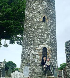 Evanna Lynch Instagram - Little Irish history tour with my Dad for @tourismireland 🌳🪨 My dad was a history teacher for over 30 years (I’m sure these pics will give his past pupils flashbacks…) so I thought it would be interesting to ask him what lesser known location he’d like to share with anyone interested in local Irish history. And his eyes lit up and he insisted we go visit the monastery in Monasterboice and this old cross! Which is actually very impressive when you realise how bloody ancient it is. Here are some facts from my dad:

🌳The cross in the pictures is St Muireadach’s Cross and is one of the finest surviving examples of early medieval Irish sculpture.

🪨 It’s situated amid the ruins of the ancient Irish monastery of Monasterboice in Co.Louth.

🌲Muireadach’s Cross is from the 10th century and is thought to have been called after Muireadach Mac Domhnall, one of the monastery’s most famous abbots who died in 923AD.
 
🗿The carvings on the cross depict scenes from the bible and may have been used by the monks to tell the story of creation and salvation to visitors to the monastery.

☘️Ancient Irish monasteries we’re often circular and had two distinctive features: a round tower and one or more high crosses, both of which you can see in these pics. 

Check out my stories to see my dad explaining some of the scenes on the cross. His passion is very infectious ☺️ Thanks @tourismireland for encouraging me to rediscover some of the history of Co.Louth, we do have some cool things going on in the wee county.

#WelcomingSoon #Ad #Ireland #TourismIreland