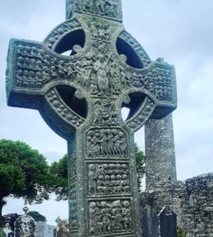 Evanna Lynch Instagram - Little Irish history tour with my Dad for @tourismireland 🌳🪨 My dad was a history teacher for over 30 years (I’m sure these pics will give his past pupils flashbacks…) so I thought it would be interesting to ask him what lesser known location he’d like to share with anyone interested in local Irish history. And his eyes lit up and he insisted we go visit the monastery in Monasterboice and this old cross! Which is actually very impressive when you realise how bloody ancient it is. Here are some facts from my dad:

🌳The cross in the pictures is St Muireadach’s Cross and is one of the finest surviving examples of early medieval Irish sculpture.

🪨 It’s situated amid the ruins of the ancient Irish monastery of Monasterboice in Co.Louth.

🌲Muireadach’s Cross is from the 10th century and is thought to have been called after Muireadach Mac Domhnall, one of the monastery’s most famous abbots who died in 923AD.
 
🗿The carvings on the cross depict scenes from the bible and may have been used by the monks to tell the story of creation and salvation to visitors to the monastery.

☘️Ancient Irish monasteries we’re often circular and had two distinctive features: a round tower and one or more high crosses, both of which you can see in these pics. 

Check out my stories to see my dad explaining some of the scenes on the cross. His passion is very infectious ☺️ Thanks @tourismireland for encouraging me to rediscover some of the history of Co.Louth, we do have some cool things going on in the wee county.

#WelcomingSoon #Ad #Ireland #TourismIreland