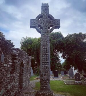 Evanna Lynch Instagram - Little Irish history tour with my Dad for @tourismireland 🌳🪨 My dad was a history teacher for over 30 years (I’m sure these pics will give his past pupils flashbacks…) so I thought it would be interesting to ask him what lesser known location he’d like to share with anyone interested in local Irish history. And his eyes lit up and he insisted we go visit the monastery in Monasterboice and this old cross! Which is actually very impressive when you realise how bloody ancient it is. Here are some facts from my dad:

🌳The cross in the pictures is St Muireadach’s Cross and is one of the finest surviving examples of early medieval Irish sculpture.

🪨 It’s situated amid the ruins of the ancient Irish monastery of Monasterboice in Co.Louth.

🌲Muireadach’s Cross is from the 10th century and is thought to have been called after Muireadach Mac Domhnall, one of the monastery’s most famous abbots who died in 923AD.
 
🗿The carvings on the cross depict scenes from the bible and may have been used by the monks to tell the story of creation and salvation to visitors to the monastery.

☘️Ancient Irish monasteries we’re often circular and had two distinctive features: a round tower and one or more high crosses, both of which you can see in these pics. 

Check out my stories to see my dad explaining some of the scenes on the cross. His passion is very infectious ☺️ Thanks @tourismireland for encouraging me to rediscover some of the history of Co.Louth, we do have some cool things going on in the wee county.

#WelcomingSoon #Ad #Ireland #TourismIreland