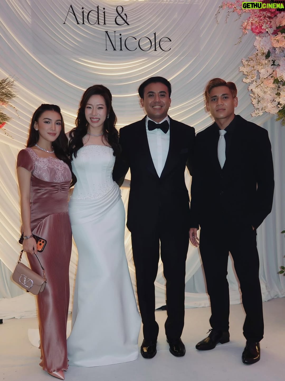 Eyka Farhana - 39.5K Likes - First wedding date with my husband 🩷✨ 
Congrats Nicole & Aidi! You guys are a perfect match. May your love grow stronger forever and may your marriage be filled with everlasting love and happiness. 

In my custom made by @merahjambuofficial_ 🤍 I told Hana I wanted something simple but sweet, and she truly made it happen. Thank you for making my dress look so sweet ✨