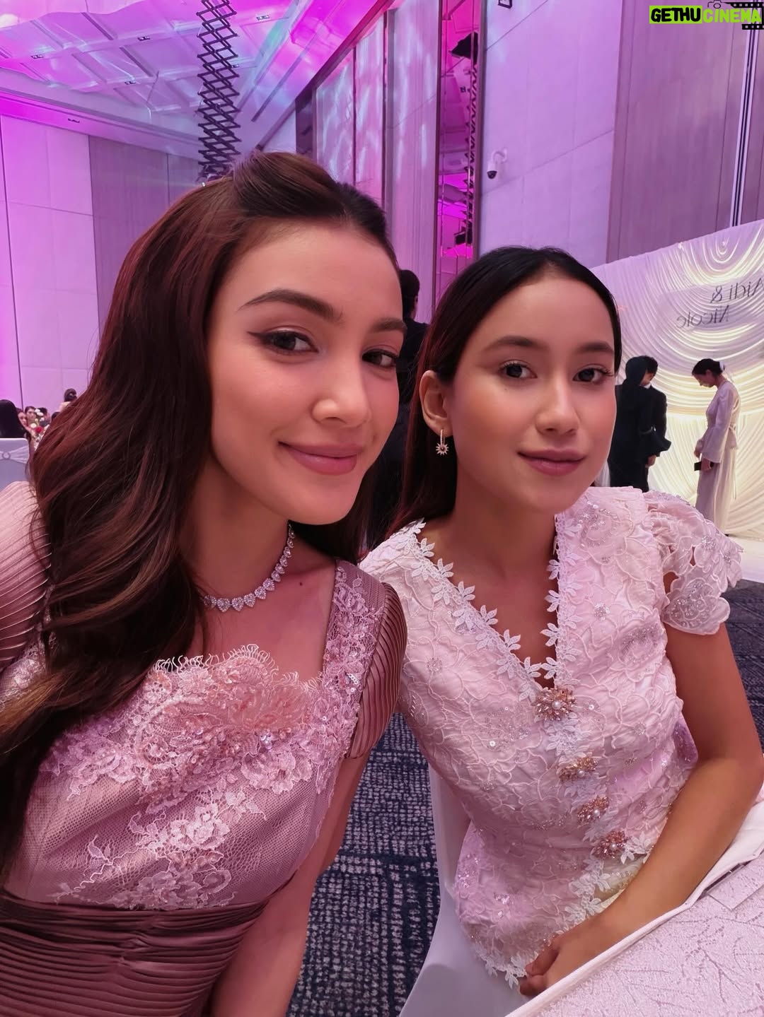 Eyka Farhana - 39.5K Likes - First wedding date with my husband 🩷✨ 
Congrats Nicole & Aidi! You guys are a perfect match. May your love grow stronger forever and may your marriage be filled with everlasting love and happiness. 

In my custom made by @merahjambuofficial_ 🤍 I told Hana I wanted something simple but sweet, and she truly made it happen. Thank you for making my dress look so sweet ✨