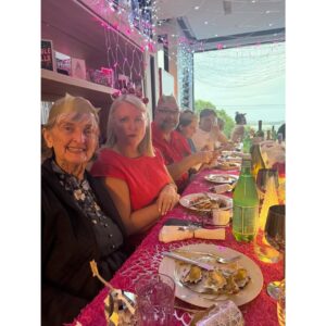Johanna Griggs Instagram - Christmas 2025. Spent with the people we love most in the world (and a couple missing but coming in hot today). This years table theme was based purely around our beautiful Matriarch Leigh Griggs’s favourite colour - hot pink. Thank you to my beautiful husband @toddyhuggins and gorgeous sons @sweeetsy and @joesweet for helping me get the house and table Christmas ready. And to the incredible artist Anita from @hillsflowermarket who works with me every year to help bring our table to life with the must beautiful blooms - thank you. 🙏🏼. I hope everyone had a wonderful and safe day yesterday. ❤️❤️❤️🎅🎄🤶