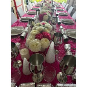 Johanna Griggs Instagram - Christmas 2025. Spent with the people we love most in the world (and a couple missing but coming in hot today). This years table theme was based purely around our beautiful Matriarch Leigh Griggs’s favourite colour - hot pink. Thank you to my beautiful husband @toddyhuggins and gorgeous sons @sweeetsy and @joesweet for helping me get the house and table Christmas ready. And to the incredible artist Anita from @hillsflowermarket who works with me every year to help bring our table to life with the must beautiful blooms - thank you. 🙏🏼. I hope everyone had a wonderful and safe day yesterday. ❤️❤️❤️🎅🎄🤶