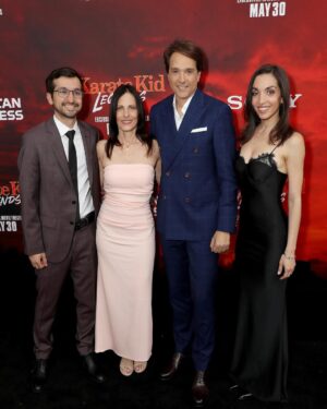 Julia Macchio Instagram - @karatekidmovie premiere was such a blast! Nostalgia, lots of laughs, NYC, so much heart and holy stunts!!! One of my favorite parts of the evening was seeing so many people lined up on the streets of New York wearing their karate gis and cheering/smiling so big. Congrats to everyone involved. Always so proud of you, Dad! Go see it in theaters this Friday!! 🍿🌆🥋🍕🧥❤️ Okay brb, gonna go eat some stuffed crust pizza… 

Fam photo cred - StarPix 📸