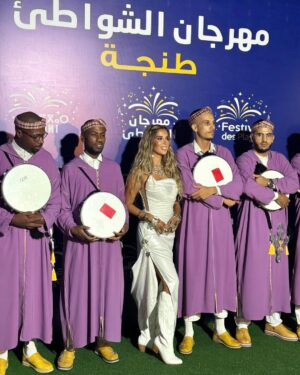 Karima Gouit Instagram - Tanger 💫 طنجة thank you 🤍🔥

Ayuz ⵣ

@rimcom.groupemaroc 
@jamalbaden 
@maroctelecom 

Dress : @lagarderobes 
Accessoires : @malika_mouzyene 
Styling : @othmanessahat 
@adilchamaliofficial 

شكر كبير للفرقة الموسيقية وأحواش 🔥
