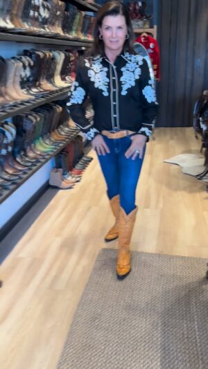 Kimberlin Brown Instagram - Picked up my new #custom #boots today @bootstarusa on the #sunsetstrip in #LosAngeles  Made by @stallion_boots in #Texas Thank you @scotteybroussard for taking me on this incredible journey. Bless your family and may you rest in peace my friend. You’ll be with me every time I slip these beauties on.  And…thank you @bootstarusa for making my vision come to life!! LOVE my boots!! #cowboyboots #beautiful AND…yes, I bought the shirt!!!