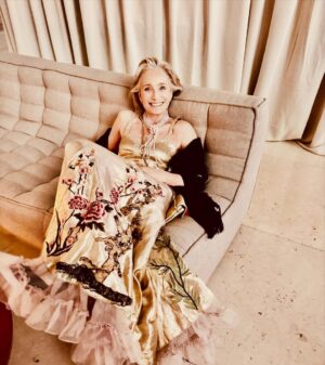 Kristin Scott Thomas Instagram - Me very happy at the British Museum on Saturday night snapped by my darling friend @jasperconran My much admired dress came from @onevintagedesigns and my pink pearls from @londonpearlgirl  hair and makeup DIY  That was a fun evening but there were so many lovely friends I failed to talk to… can we have another go?