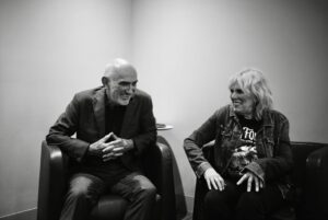 Lucinda Williams Instagram - I recently was in Australia touring with Paul Kelly & The Messengers and it was one of the highlights of my year.Ā It was just fantastic to see him fill arenas all over Australia. ItĀ is always great to see the love and appreciation for an artist that means so much to his country (the way Bob Dylan means so much to us over here), and to be a part of that was exceedingly special. But it also got me thinking about why Paul is not better known here in the US. Yes ,I know Australia is a long way away, but these days that shouldnāt matter much. Paul has been writing great songs and making great records for many years and I feel that he deserves to be better known here in the US. This week Paul is released his new album ā70ā and it is another great piece of work. Please give it a listen. He is for all of us, not just Australia. ā¤ļøāš„