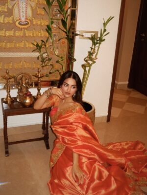 Mehak Bakshi Instagram - draped in Kanchipuram, wrapped in legacy @kanchi_vasthra 🧡
Kanchipuram sarees aren’t just pieces of fabric, they’re a legacy woven with skill, love and generations of craftsmanship.
In a world where many artisans struggle to sustain this beautiful art form, wearing Kanchipuram is a small way to keep the craft alive. Every thread tells a story of culture and support the weavers behind it. Let’s keep the tradition alive, one saree at a time 🧡✨
Ad