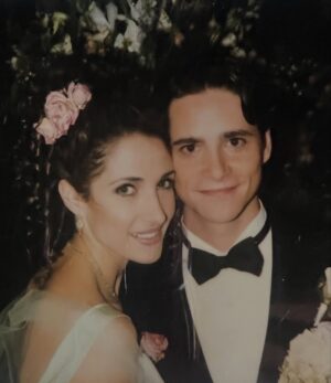 Melina Kanakaredes Instagram - Thomas Wolf said: “You can never go home again” but John Masius believed that with a little divine “PROVIDENCE” #SydHansen could!♥️ 26 years ago this show changed so many lives - especially mine!! I LOVED playing Syd Hansen! From the DREAMS and  COSTUMES to the amazing FAMILY we became in front of and especially behind the camera— Thank you John for creating #Providence♥️ And thank you to @scarletmasius for giving me that polaroid of us when we first met on the set!! I hope you all enjoy these photos as much as I did. ♥️ RIP John♥️