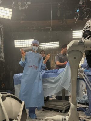 Natalie Morales Instagram - Monica from start to finish- 

I feel very lucky to have been a small part of this legendary show and to be welcomed with such open arms by this cast and crew and massive fandom. I loved getting to play a pediatric surgeon who cared so deeply for her patients until her last breath. Thank you to everyone at @greysabc 💓 

1. Day 1! 2. Can I pull off a lab coat 3. & 4. @adelaidekane is an incredible scene partner. 5. @artist_monica gave me dead doctor chic 6. Here’s the real Monica!  7. No thank YOU for everything! 🩺🥼👩🏽‍⚕️

(There are more pictures I have with incredible crew I love so much but I literally look dead in them so I’m gonna keep those to myself 😉) 

(Ps @shondaland can u pls send me my stethoscope? I miss it)