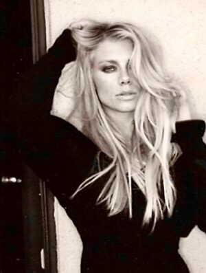 Peta Wilson Instagram - Costume Nationale dress and norma Kamali parachute skirt. After hours on a back set of LFN. Photographer Tony Notaberadino