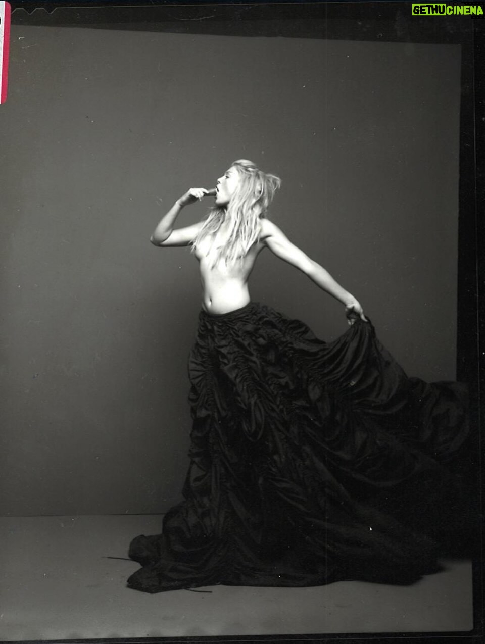 Peta Wilson - 3.6K Likes - Costume Nationale dress and norma Kamali parachute skirt. After hours on a back set of LFN. Photographer Tony Notaberadino