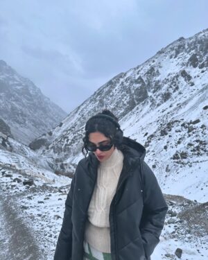 Saheefa Jabbar Khattak Instagram - Every time I start posting a lot, I end up feeling like I’ve overshared, like I’ve just let it all spill out. And to everyone who’s told me to go find a mountain or get lost in a jungle for a while and just breathe, you’re absolutely right. This year’s been packed with work and travel, but the kind of peace I felt in the cold mountains is unmatched. I think it’s the simplicity of the people, the rawness of the mountains. You’re there, feeling so small in the best way, and when a snowflake lands on you, all you can think of is The One who made all of this with just a “Be” and there it was. That thought alone, wow.
“Be” has a big place in my life. When I’m overwhelmed, it reminds me to pause, breathe, and come back to the moment. It’s this gentle nudge to just exist for a second without letting things spiral. Funny enough, out of all my tattoos, this is the only one with a real meaning.
Anyway, this is the last bit from the mountains (I guess) ❄️