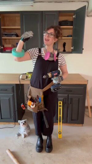 Sara Rue Instagram - When your 12 year old asks to be your social media manager you say yes! (Shot and edited by Talulah with special guest Squirrel ) 😍#missyouforgotsomething #rueityourself #diy #garageredo #momreels #dogsofinstagram