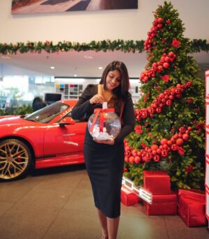 Saranya Nandakumar Instagram - Discovered the Christmas Lucky draw at @porschecentrekochi through their Instagram and had to experience it in person. 🎄

Loved walking into the festive setup, dropping my name in the bowl and checking out the Porsche lifestyle merchandise up close, such a fun little Christmas surprise moment. ✨

If you’re in Kochi, stop by @porschecentrekochi and @porscheindia, participate in the lucky draw and you might just take home some exclusive Porsche merchandise too🎁⛪