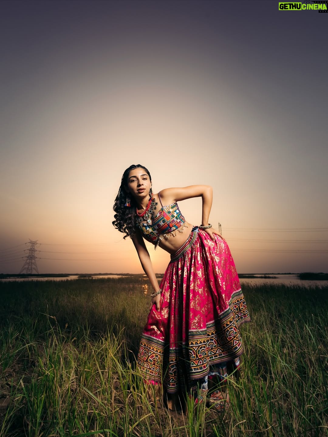 Sonam Pirani - 1.3K Likes - What is home in 2025?
Is it where you were born… or where you finally learned to breathe?
Is it the country on your passport… or the people who still check if you’ve eaten?
I come from a small, beautiful town that still smells like childhood and rain — yet every time I go back, I feel like a guest in my own memories.
I’ve built a life miles away, chasing dreams that don’t speak my mother tongue anymore.
Maybe home isn’t a place you return to.
Maybe it’s a feeling you spend your whole life trying to find again.

Shot by- @what.the.frame 
Hair and makeup @makeover_by_dharmi 
Outfit & shoes - @kalakari_bhuj
