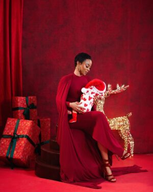 Toke Makinwa Instagram - Christmas mornings used to be so quiet, I’ll go out on Xmas Eve and sleep through the day.
Christmas 2025 helloooooooo
This year my heart is not just full, my cup runneth over.

Thank you Lord.
Merry Christmas 🎄 from Yakira Eliana and I. 
Hope your family is blessed