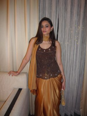 Vanya Bahl Instagram - Kaun hai woh?🌹
•
Repurposing old outfits is becoming my thing! 
- my mom told me this sarree is almost 35 years old from when she was around my age and the fabric is as good as new
- Got this top from a street market but together it looks like a look from the 90’s that I would repeat again & again! 

So excited at how beautifully this look came out🌻