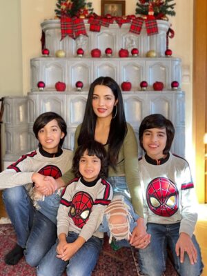 Celina Jaitly Instagram - #christmasprayer .. I never imagined a Christmas where my arms would be empty and my heart would be this full of you.

Somewhere time moved on without asking me and a moment passed that I did not know would be the last.. The last time I heard your excitement. The last time I believed tomorrow would look the same.

I miss you in ways words were never meant to carry. I miss your voices more than the silence can bear. I miss being your mummy in the everyday ways and the ordinary miracles I took for granted.

This Christmas I do not get to walk to Shamsher’s grave and watch the snow fall gently on the little cars you placed there. I do not get to hold your hands in the cold or warm them in mine.

Tonight the world is celebrating but my soul is waiting. Waiting for three little hearts that still beat inside mine.

If love had a sound it would be calling your names. If hope had a shape it would look like your faces. And if miracles are real then one of them will lead me back to you.

Until then remember this. No distance no time and no silence has the power to undo a mother’s love.

All I want for Christmas is you.
Winston Viraaj Arthur.. If love had a sound it would be calling your names.. Your names are my Christmas Prayer ..

#christmasday #christmas #bluechristmas